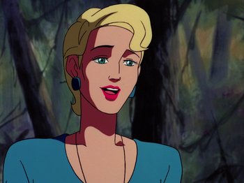 Movie still from “Scooby-Doo on Zombie Island” (1998), directed by Jim Stenstrum – A woman with blonde hair is smiling for the camera; Close Up shot, Over the shoulder angle