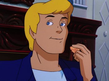 Movie still from “Scooby-Doo on Zombie Island” (1998), directed by Jim Stenstrum – A man with blonde hair is eating a piece of bread; Close Up shot, Over the shoulder angle