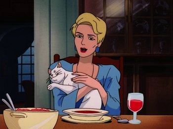 Movie still from “Scooby-Doo on Zombie Island” (1998), directed by Jim Stenstrum – A woman sitting at a dinner table with a cat; Medium shot, High angle