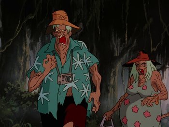 Movie still from “Scooby-Doo on Zombie Island” (1998), directed by Jim Stenstrum – An old man and a woman are walking through the woods; Medium shot, Low angle