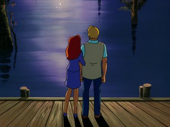 Movie still from “Scooby-Doo on Zombie Island” (1998), directed by Jim Stenstrum – Two people standing on a dock looking out at a body of water; Wide shot, High angle