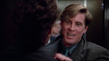 Movie still from “Scrooged” (1988), directed by Richard Donner – A person talking to another person; Close Up shot, Over the shoulder angle