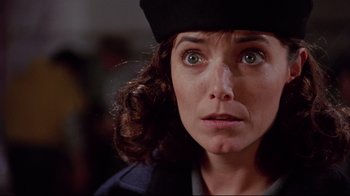 Movie still from “Scrooged” (1988), directed by Richard Donner – A person wearing a hat; Close Up shot, Low angle