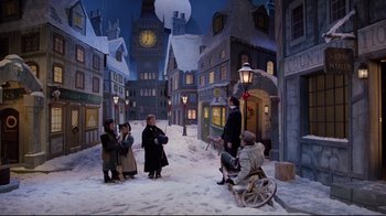 Movie still from “Scrooged” (1988), directed by Richard Donner – A group of people standing in the middle of a snowy street; Extreme Wide shot, High angle