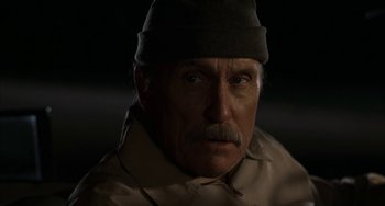 Movie still from “Secondhand Lions” (2003), directed by Tim McCanlies – An older man wearing a hat looking at the camera; Close Up shot, Low angle
