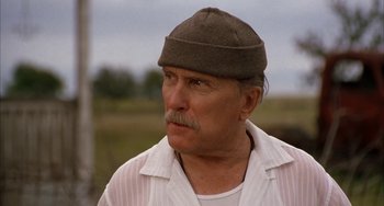 Movie still from “Secondhand Lions” (2003), directed by Tim McCanlies – An older man wearing a brown hat and a white shirt; Close Up shot, Low angle
