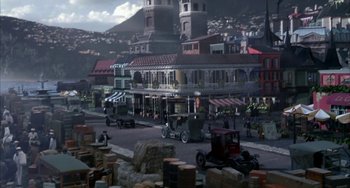 Movie still from “Secondhand Lions” (2003), directed by Tim McCanlies – An image of an old time town with a lot of cars on the road; Extreme Wide shot, High angle