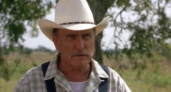 Movie still from “Secondhand Lions” (2003), directed by Tim McCanlies – An older man wearing a white cowboy hat; Close Up shot, Over the shoulder angle