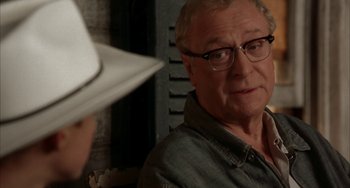 Movie still from “Secondhand Lions” (2003), directed by Tim McCanlies – An older man wearing glasses and a cowboy hat; Close Up shot, Over the shoulder angle