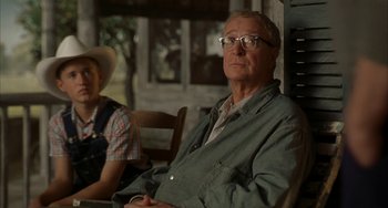 Movie still from “Secondhand Lions” (2003), directed by Tim McCanlies – An older man sitting next to an older woman; Medium shot, Over the shoulder angle
