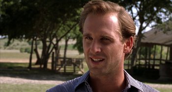 Movie still from “Secondhand Lions” (2003), directed by Tim McCanlies – A person wearing a plaid shirt; Close Up shot, Over the shoulder angle