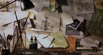 Movie still from “Secondhand Lions” (2003), directed by Tim McCanlies – A desk with a lamp and a bottle of ink on top of it; Extreme Close Up shot, High angle