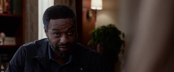 Movie still from “Secret in Their Eyes” (2015), directed by Billy Ray – A person with a beard; Close Up shot, Over the shoulder angle