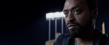 Movie still from “Secret in Their Eyes” (2015), directed by Billy Ray – A person with a beard; Close Up shot, Low angle