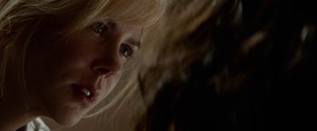 Movie still from “Secret in Their Eyes” (2015), directed by Billy Ray – A woman's face with long blonde hair; Extreme Close Up shot, Over the shoulder angle