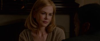 Movie still from “Secret in Their Eyes” (2015), directed by Billy Ray – A woman with blonde hair sitting in front of a mirror; Close Up shot, Over the shoulder angle