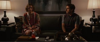 Movie still from “Seeking a Friend for the End of the World” (2012), directed by Lorene Scafaria – A man and a woman sitting in a living room; Medium shot, Over the shoulder angle