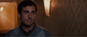 Movie still from “Seeking a Friend for the End of the World” (2012), directed by Lorene Scafaria – A person wearing a sweater; Medium shot, Over the shoulder angle