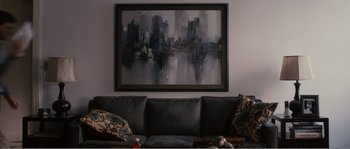 Movie still from “Seeking a Friend for the End of the World” (2012), directed by Lorene Scafaria – A painting hanging on the wall of a living room; Wide shot, High angle