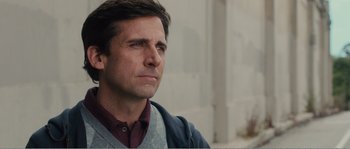 Movie still from “Seeking a Friend for the End of the World” (2012), directed by Lorene Scafaria – A person wearing a jacket; Close Up shot, Over the shoulder angle