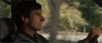 Movie still from “Seeking a Friend for the End of the World” (2012), directed by Lorene Scafaria – A person looking out of a window; Close Up shot, Low angle