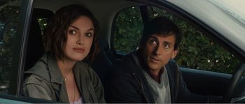 Movie still from “Seeking a Friend for the End of the World” (2012), directed by Lorene Scafaria – A man and a woman sitting in the back of a car; Close Up shot, Over the shoulder angle