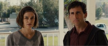 Movie still from “Seeking a Friend for the End of the World” (2012), directed by Lorene Scafaria – A man and a woman standing next to each other outside; Medium shot, Over the shoulder angle