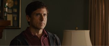 Movie still from “Seeking a Friend for the End of the World” (2012), directed by Lorene Scafaria – A person wearing a jacket; Close Up shot, Over the shoulder angle