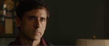Movie still from “Seeking a Friend for the End of the World” (2012), directed by Lorene Scafaria – A person wearing a jacket; Close Up shot, Over the shoulder angle