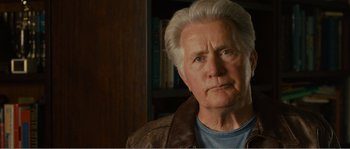 Movie still from “Seeking a Friend for the End of the World” (2012), directed by Lorene Scafaria – An older man with white hair and wearing a jacket; Close Up shot, Low angle