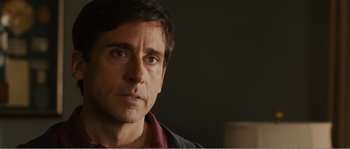 Movie still from “Seeking a Friend for the End of the World” (2012), directed by Lorene Scafaria – A person wearing a jacket; Close Up shot, Over the shoulder angle