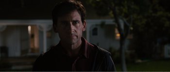 Movie still from “Seeking a Friend for the End of the World” (2012), directed by Lorene Scafaria – A person wearing a shirt; Close Up shot, Over the shoulder angle