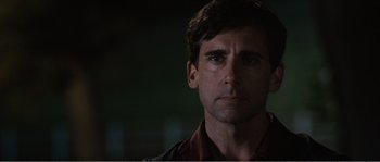 Movie still from “Seeking a Friend for the End of the World” (2012), directed by Lorene Scafaria – A person looking at the camera; Close Up shot, Over the shoulder angle