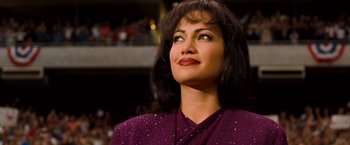 Movie still from “Selena” (1997), directed by Gregory Nava – A person wearing a purple dress; Close Up shot, Low angle
