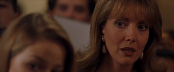 Movie still from “Selena” (1997), directed by Gregory Nava – A person wearing a dress; Close Up shot, Over the shoulder angle