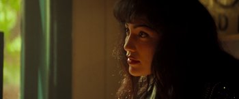Movie still from “Selena” (1997), directed by Gregory Nava – A person with long hair; Close Up shot, Low angle