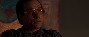 Movie still from “Selena” (1997), directed by Gregory Nava – A person wearing glasses; Close Up shot, Low angle