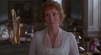 Movie still from “Sense and Sensibility” (1995), directed by Ang Lee – A woman in a white dress standing in front of a chair; Close Up shot, Over the shoulder angle