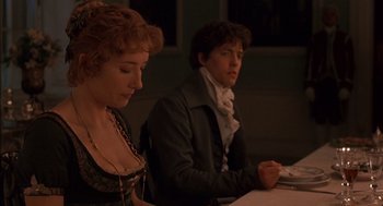 Movie still from “Sense and Sensibility” (1995), directed by Ang Lee – A man and a woman sitting at a dinner table; Medium shot, Over the shoulder angle