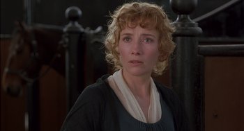 Movie still from “Sense and Sensibility” (1995), directed by Ang Lee – A person with curly blonde hair; Close Up shot, Over the shoulder angle