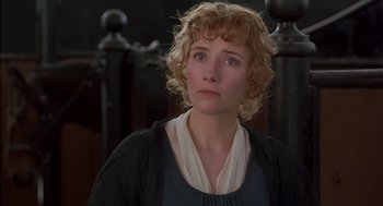 Movie still from “Sense and Sensibility” (1995), directed by Ang Lee – A person with curly blonde hair; Close Up shot, Over the shoulder angle