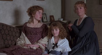 Movie still from “Sense and Sensibility” (1995), directed by Ang Lee – A group of women sitting next to each other in a living room; Medium shot, High angle