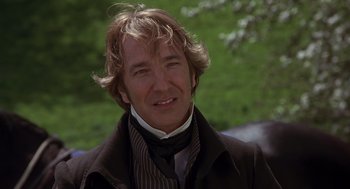Movie still from “Sense and Sensibility” (1995), directed by Ang Lee – A person wearing a suit and tie; Close Up shot, Low angle