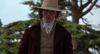 Movie still from “Sense and Sensibility” (1995), directed by Ang Lee – A man wearing a hat and a jacket; Close Up shot, Low angle