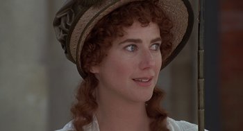 Movie still from “Sense and Sensibility” (1995), directed by Ang Lee – A person wearing a hat; Close Up shot, Over the shoulder angle