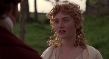 Movie still from “Sense and Sensibility” (1995), directed by Ang Lee – A person with curly hair; Close Up shot, Over the shoulder angle