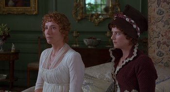 Movie still from “Sense and Sensibility” (1995), directed by Ang Lee – Two women sitting on a bed in front of each other; Close Up shot, Over the shoulder angle