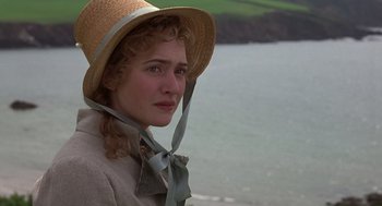 Movie still from “Sense and Sensibility” (1995), directed by Ang Lee – A young woman wearing a straw hat near the water; Close Up shot, Over the shoulder angle