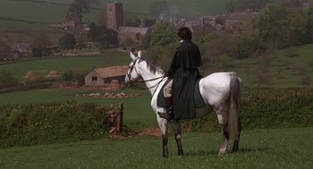 Movie still from “Sense and Sensibility” (1995), directed by Ang Lee – A person on a horse looking out at the countryside; Wide shot, Over the shoulder angle