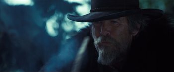 Movie still from “Seraphim Falls” (2006), directed by David Von Ancken – A person wearing a hat; Close Up shot, Low angle